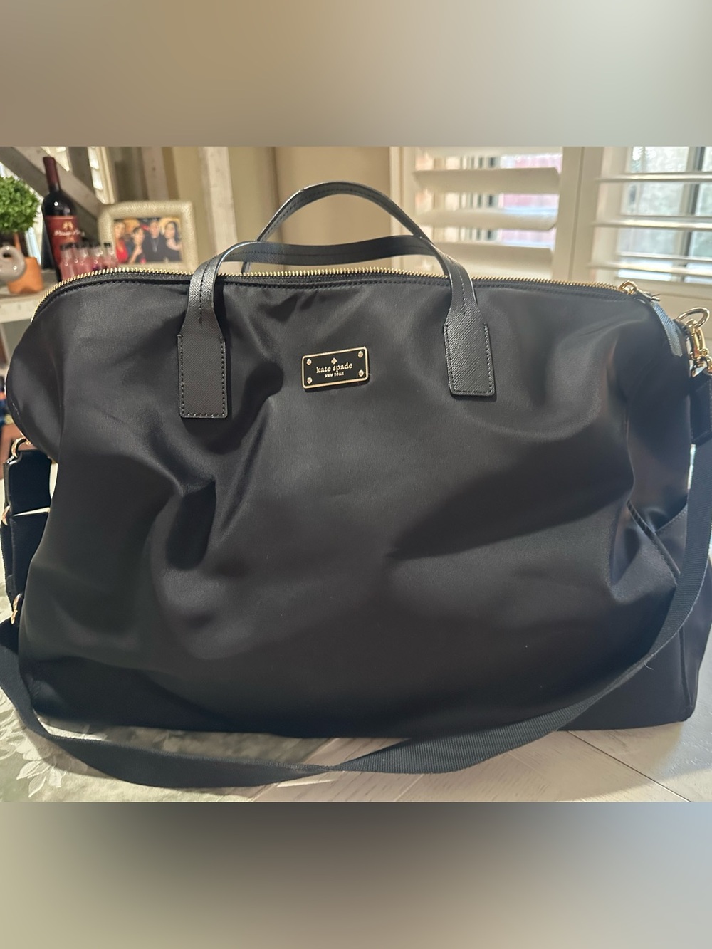 kate spade black nylon duffel with gold hardware